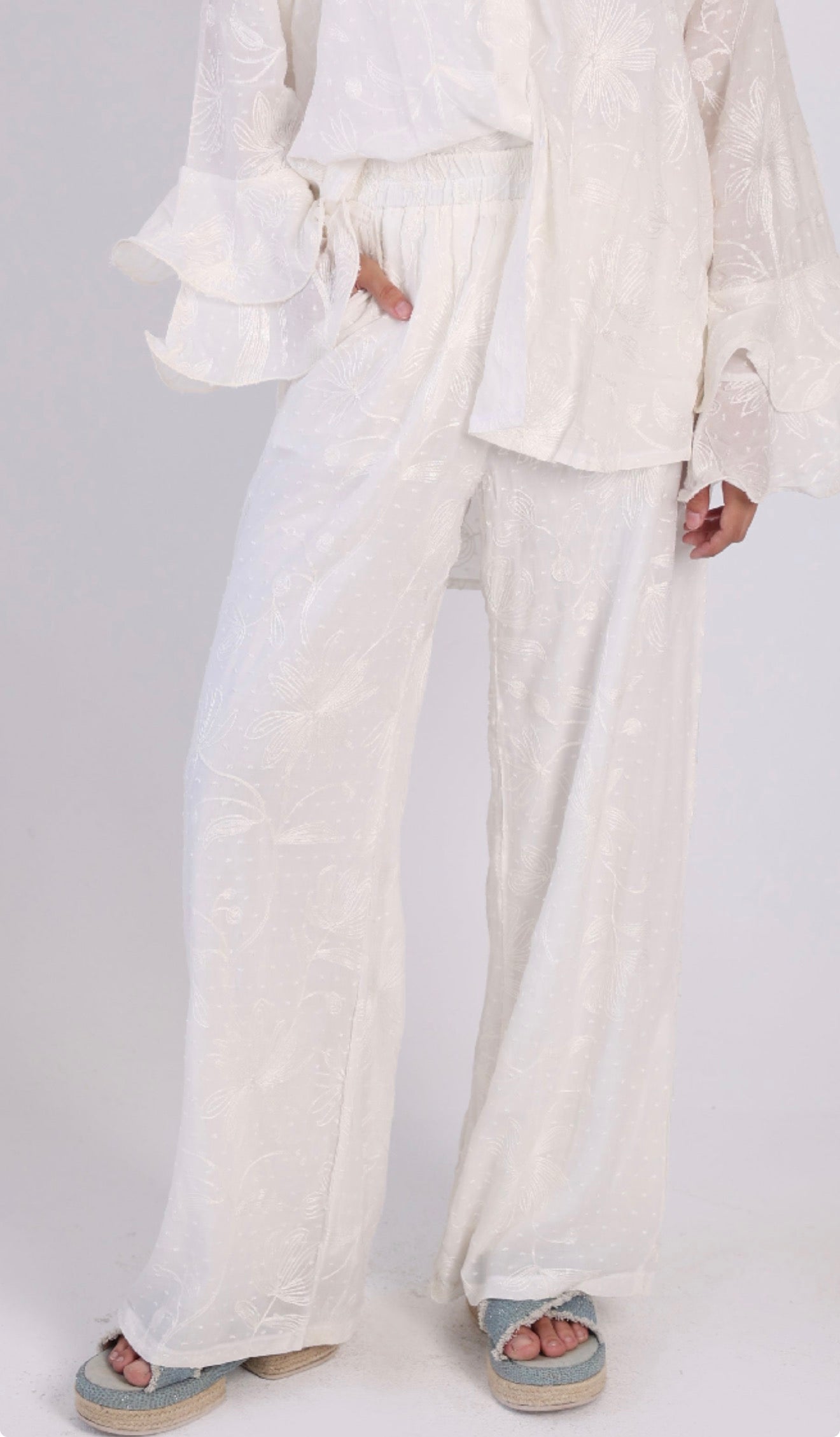 White embroidered pants