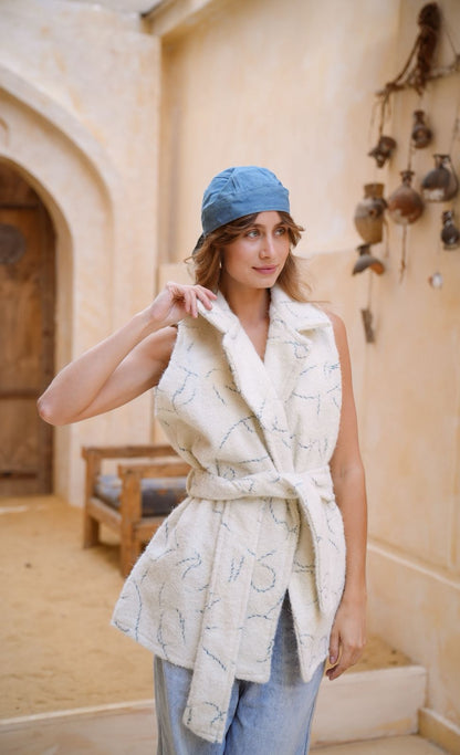 Embroidered belted vest